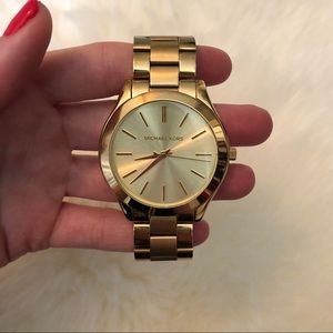 Michael Kors gold slim runway watch